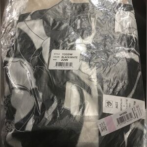 Brand new still in package comes with necklace